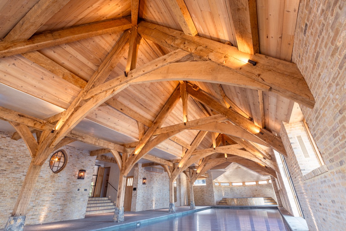 New oak-framed pool house with hand-cut green oak trusses